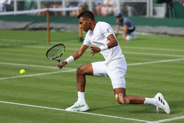 Wimbledon: Day One 3 July 2023, Wimbledon - Wimbledon Tennis Championships - Day One - Felix Auger-Aliassime (CAN) in action during his Gentlemen s Singles 1st Round match against Michael Mmoh (USA) - Photo: Charlotte Wilson Offside . Wimbledon UK Copyright: xCharlottexWilsonx xOffsidexOffside