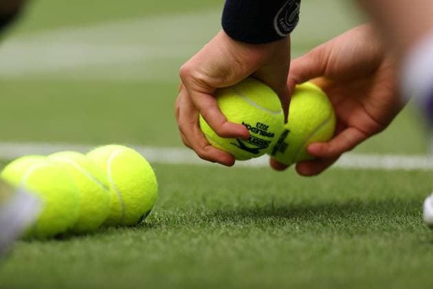 3rd July 2023; All England Lawn Tennis and Croquet Club, London, England: Wimbledon Tennis Tournament Day 1; Ladies singles match, Venus Willians versus Elina Svitolina. Ball kinds open a set of new balls for the match  ActionPlus12526814 ShaunxBrooks