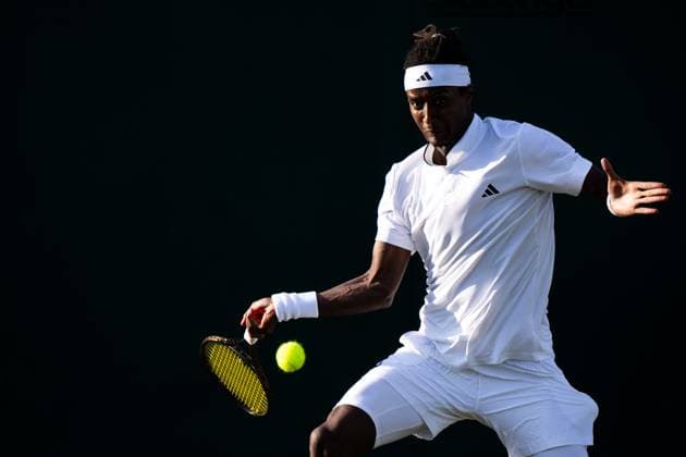 230703 Mikael Ymer of Sweden competes in a first round singles tennis match during day 1 of Wimbledon on July 3, 2023 in London. Photo: Jesper Zerman BILDBYRAN COP 234 JZ0389 tennis wimbledon day 1 bbeng Copyright: JESPERxZERMAN BB230703JZ025