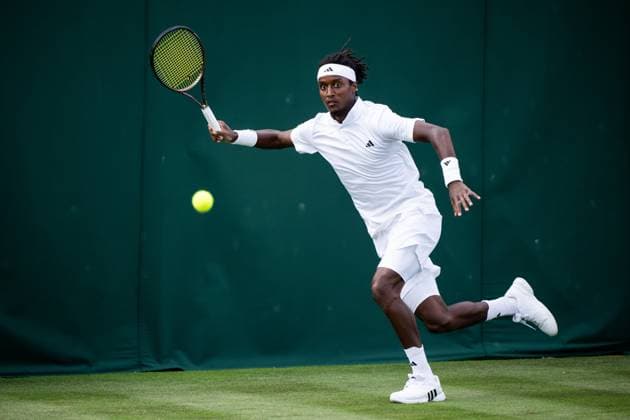 230703 Mikael Ymer of Sweden competes in a first round singles tennis match during day 1 of Wimbledon on July 3, 2023 in London. Photo: Jesper Zerman BILDBYRAN COP 234 JZ0389 tennis wimbledon day 1 bbeng Copyright: JESPERxZERMAN BB230703JZ039