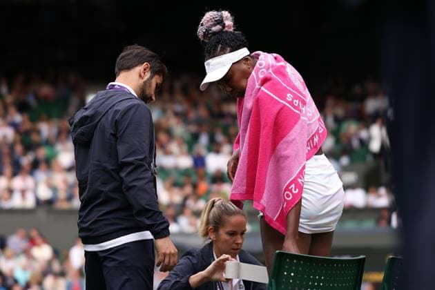 3rd July 2023; All England Lawn Tennis and Croquet Club, London, England: Wimbledon Tennis Tournament; Venus Williams receives a medical time out during her match with Elina Svitolina , womens singles  ActionPlus12526863 ShaunxBrooks