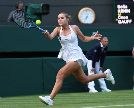 America s Sofia Kenin plays a forehand during her first round match against America s Coco Gauff on day one of the 2023 Wimbledon championships in London on Monday, July 03, 2023.  LON2023070377 HUGOxPHILPOTT