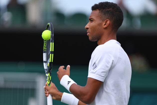 3rd July 2023; All England Lawn Tennis and Croquet Club, London, England: Wimbledon Tennis Tournament; Felix Auger-Aliassime during his match with Michael Mmoh  ActionPlus12526899 ShaunxBrooks