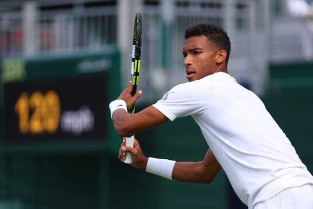 3rd July 2023; All England Lawn Tennis and Croquet Club, London, England: Wimbledon Tennis Tournament; Felix Auger-Aliassime during his match with Michael Mmoh  ActionPlus12526900 ShaunxBrooks