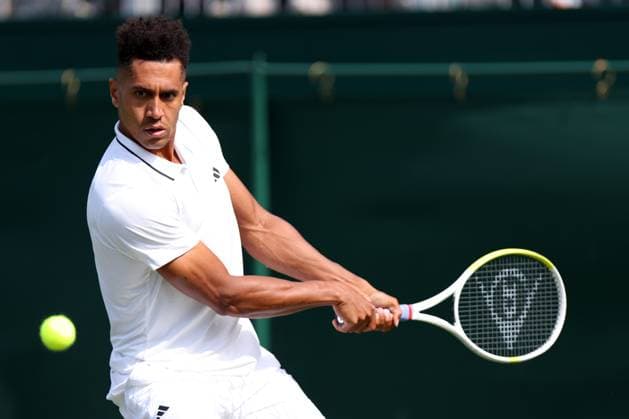 3rd July 2023; All England Lawn Tennis and Croquet Club, London, England: Wimbledon Tennis Tournament; Michael Mmoh during his match with Felix Auger-Aliassime  ActionPlus12526902 ShaunxBrooks