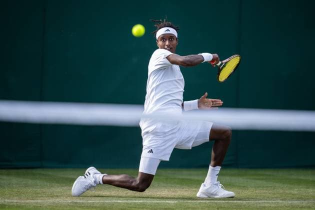 230703 Mikael Ymer of Sweden competes in a first round singles tennis match during day 1 of Wimbledon on July 3, 2023 in London. Photo: Jesper Zerman BILDBYRAN COP 234 JZ0389 tennis wimbledon day 1 bbeng Copyright: JESPERxZERMAN BB230703JZ061