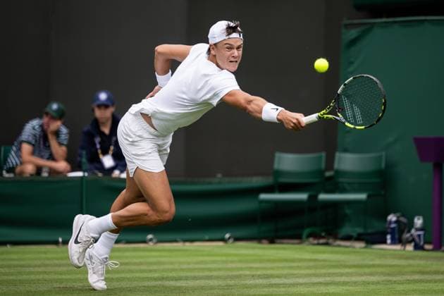 230704 Holger Rune of Denmark competes in a first round singles tennis match on July 4, 2023 in London. Photo: Jesper Zerman BILDBYRAN COP 234 JZ0390 tennis wimbledon day 2 bbeng Copyright: JESPERxZERMAN BB230704JZ008