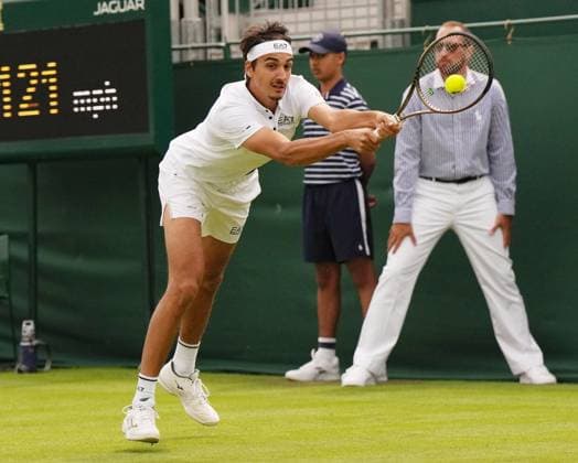 Tennis - 2023 Wimbledon Championships - Week One - Day Two - All England Lawn Tennis & Croquet Club, Wimbledon - Tuesday 4th July 2023 Matteo Berrettini (ITA) v Lorenzo Sonego (ITA) Lorenzo Sonego (ITA) 