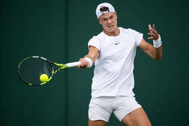 230704 Holger Rune of Denmark competes in a first round singles tennis match on July 4, 2023 in London. Photo: Jesper Zerman BILDBYRAN COP 234 JZ0390 tennis wimbledon day 2 bbeng Copyright: JESPERxZERMAN BB230704JZ018