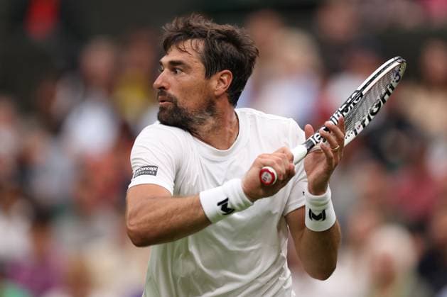 4th July 2023; All England Lawn Tennis and Croquet Club, London, England: Wimbledon Tennis Tournament; Jeremy Chardy plays a backhand shot to Carlos Alcaraz  ActionPlus12527020 ShaunxBrooks