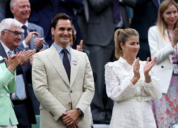 (230704) -- LONDON, July 4, 2023 -- Roger Federer (L) stands with his wife Mirka Federer at Centre Court ahead of play on Day 2 of Wimbledon Tennis Championships in London, Britain, July 4, 2023. ) (SP)BRITAIN-LONDON-TENNIS-WIMBLEDON-ROGER FEDERER LixYing 