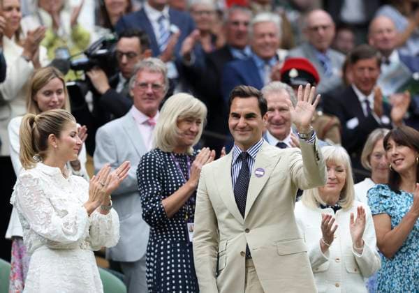 (230704) -- LONDON, July 4, 2023 -- Roger Federer (front R) waves to spectators at Centre Court ahead of play on Day 2 of Wimbledon Tennis Championships in London, Britain, July 4, 2023. ) (SP)BRITAIN-LONDON-TENNIS-WIMBLEDON-ROGER FEDERER HanxYan 