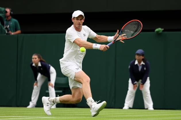 4th July 2023; All England Lawn Tennis and Croquet Club, London, England: Wimbledon Tennis Tournament; Andy Murray plays a backhand shot to Ryan Peniston  ActionPlus12527081 ShaunxBrooks