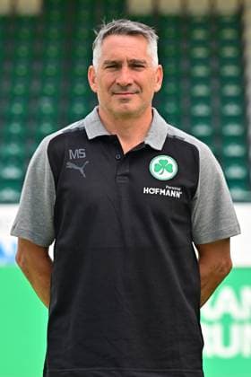 04.07.2023 - SpVgg Greuther Fürth ( Kleeblatt Spielvereinigung ) - 2. Fussball Bundesliga - Saison 2023 2024 - Fototermin Porträttermin Vorstellung Präsentation Pressetermin - - Einzelbild Einzelfoto Portrait Porträt Kopfbild - Michael Schleinkofer (Athletik-Trainer SpVgg Greuther Fürth )