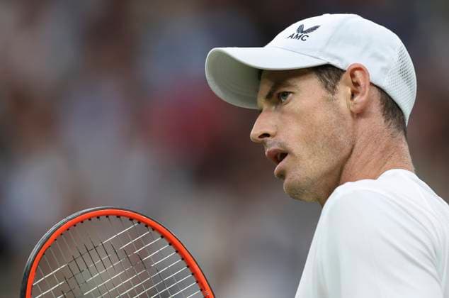 (230705) -- LONDON, July 5, 2023 -- Andy Murray of Britain reacts during the men s singles first round match against Ryan Peniston of Britain at Wimbledon tennis Championships in London, Britain, on July 4, 2023. ) (SP)BRITAIN-LONDON-TENNIS-WIMBLEDON-DAY 2 HanxYan 