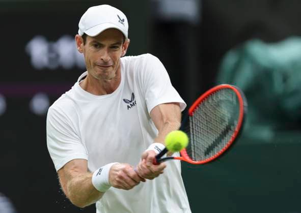 (230705) -- LONDON, July 5, 2023 -- Andy Murray of Britain returns a shot during the men s singles first round match against Ryan Peniston of Britain at Wimbledon tennis Championships in London, Britain, on July 4, 2023. ) (SP)BRITAIN-LONDON-TENNIS-WIMBLEDON-DAY 2 HanxYan 