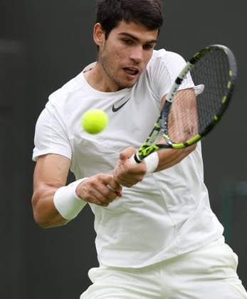 (230705) -- LONDON, July 5, 2023 -- Carlos Alcaraz of Spain returns a shot during the men s singles first round match against Jeremy Chardy of France at Wimbledon Tennis Championships in London, Britain, July 4, 2023. ) (SP)BRITAIN-LONDON-TENNIS-WIMBLEDON-DAY 2 LixYing 