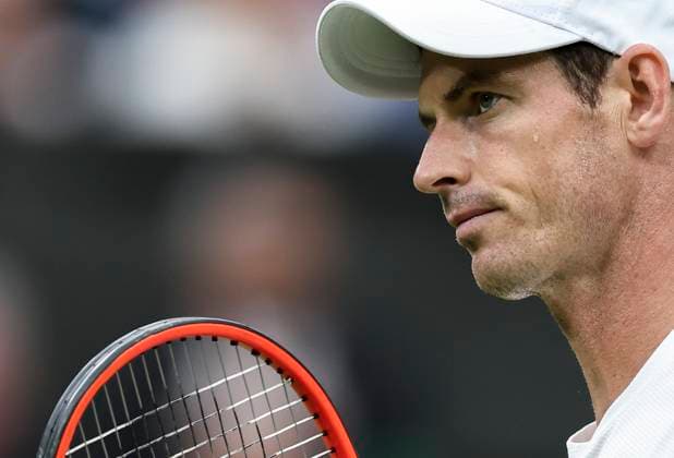 (230705) -- LONDON, July 5, 2023 -- Andy Murray of Britain reacts during the men s singles first round match against Ryan Peniston of Britain at Wimbledon tennis Championships in London, Britain, on July 4, 2023. ) (SP)BRITAIN-LONDON-TENNIS-WIMBLEDON-DAY 2 HanxYan 