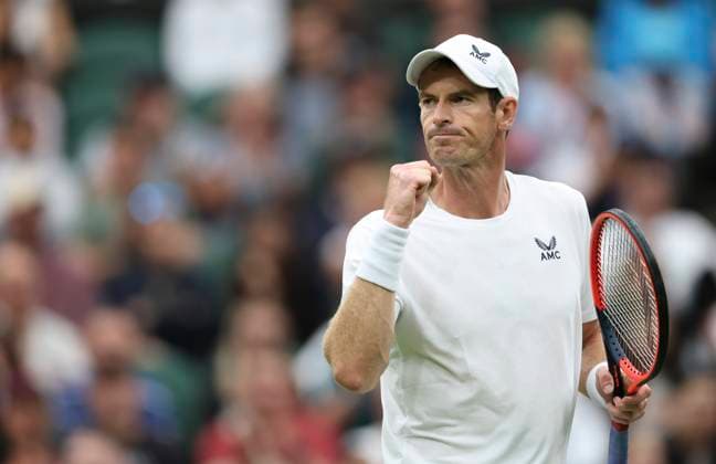 (230705) -- LONDON, July 5, 2023 -- Andy Murray of Britain celebrates during the men s singles first round match against Ryan Peniston of Britain at Wimbledon tennis Championships in London, Britain, on July 4, 2023. ) (SP)BRITAIN-LONDON-TENNIS-WIMBLEDON-DAY 2 HanxYan 