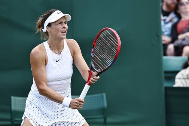 Tatjana Maria, GER, during rain delayed first round of 2023 All England Lawn Tennis Championships at Wimbledon, womens singles, London, 05 07 2023; -