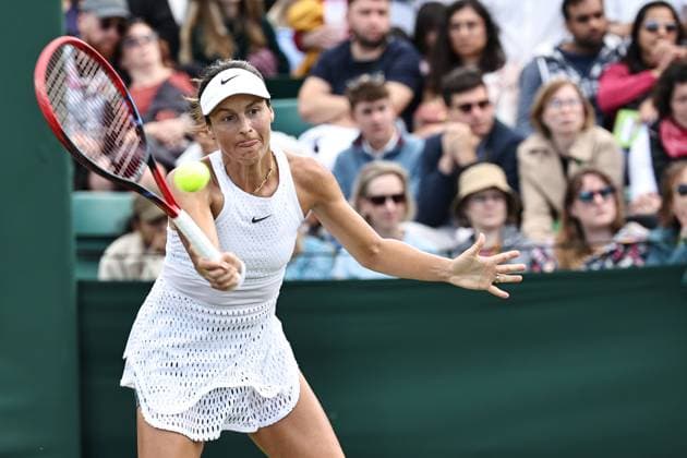 Tatjana Maria, GER, during rain delayed first round of 2023 All England Lawn Tennis Championships at Wimbledon, womens singles, London, 05 07 2023; -