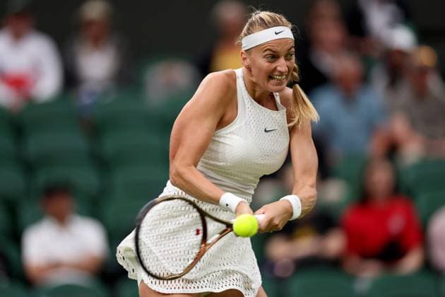 5th July 2023; All England Lawn Tennis and Croquet Club, London, England: Wimbledon Tennis Tournament; Petra Kvitova plays a backhand shot to Jasmine Paolini  ActionPlus12527348 ShaunxBrooks