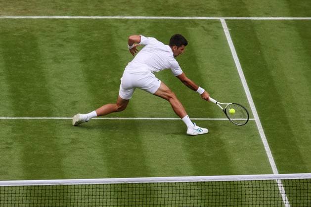 Wimbledon: Day Three 5 July 2023, Wimbledon - Wimbledon Tennis Championships - Day Three - Novak Djokovic (SRB) stretches for the ball - Photo: Charlotte Wilson Offside . Wimbledon UK Copyright: xCharlottexWilsonx xOffsidexOffside