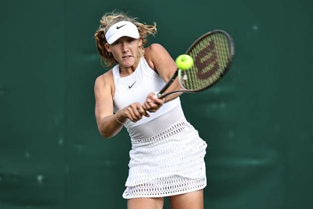 Mirra Andreeva, RUS, during rain delayed first round of 2023 All England Lawn Tennis Championships at Wimbledon, womens singles, London, 05 07 2023; -