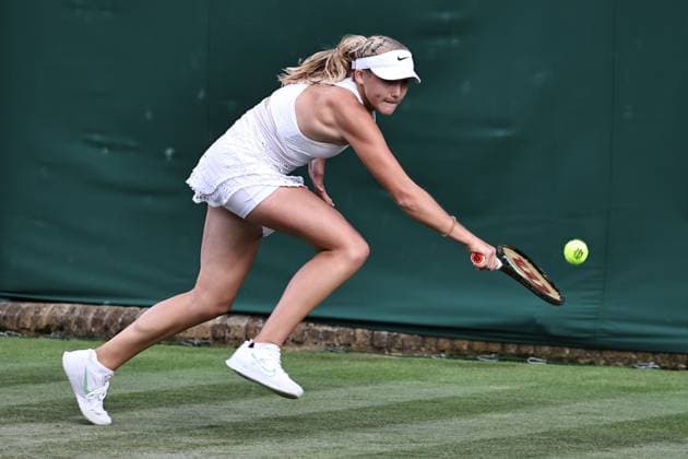 Mirra Andreeva, RUS, during rain delayed first round of 2023 All England Lawn Tennis Championships at Wimbledon, womens singles, London, 05 07 2023; -