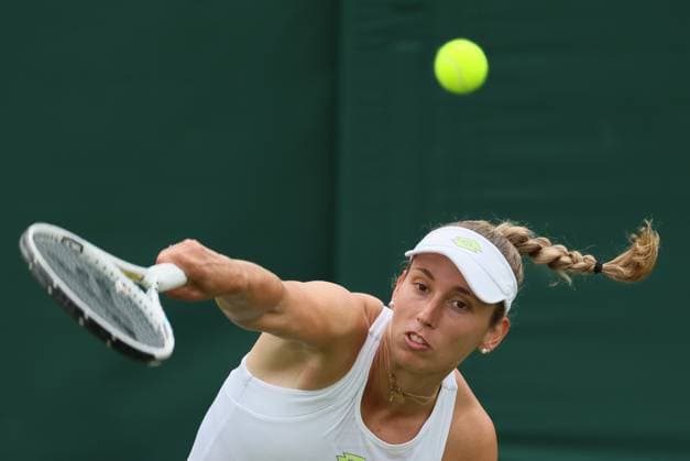 Belgian Elise Mertens pictured in action during the match between Belgian Mertens and Ukrainian Svitolina, in the Women s Singles Second Round, at the 2023 Wimbledon grand slam tennis tournament at the All England Tennis Club, in south-west London, Britain, . Due to the bad weather, play had to be suspended on Tuesday and Wednesday, and lots of matches had to be postponed. BENOITxDOPPAGNE  x70171687x