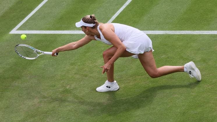 Belgian Elise Mertens pictured in action during the match between Belgian Mertens and Ukrainian Svitolina, in the Women s Singles Second Round, at the 2023 Wimbledon grand slam tennis tournament at the All England Tennis Club, in south-west London, Britain, . Due to the bad weather, play had to be suspended on Tuesday and Wednesday, and lots of matches had to be postponed. BENOITxDOPPAGNE  x70171980x