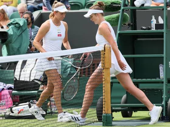 Belgian Elise Mertens and Ukrainian Elina Svitolina pictured during the match between Belgian Mertens and Ukrainian Svitolina, in the Women s Singles Second Round, at the 2023 Wimbledon grand slam tennis tournament at the All England Tennis Club, in south-west London, Britain, . Due to the bad weather, play had to be suspended on Tuesday and Wednesday, and lots of matches had to be postponed. BENOITxDOPPAGNE  x70173673x