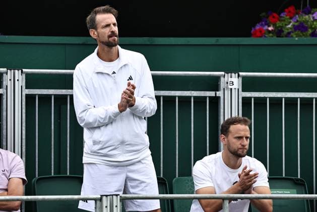Christopher Kas (left, coach of Jule Niemeier, GER) during rain delayed first round of 2023 All England Lawn Tennis Championships at Wimbledon, womens singles, London, 06 07 2023; -