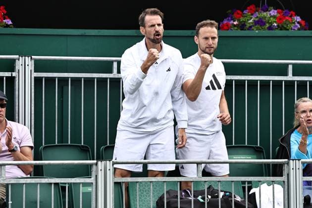 Christopher Kas (left, coach of Jule Niemeier, GER) during rain delayed first round of 2023 All England Lawn Tennis Championships at Wimbledon, womens singles, London, 06 07 2023; -