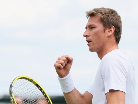 Belgian Kimmer Coppejans reacts during the second part of the match between Belgian Coppejans and Australian De Minaur, in the Men s Singles First Round, at the 2023 Wimbledon grand slam tennis tournament at the All England Tennis Club, in south-west London, Britain, . Due to the bad weather, play had to be suspended on Tuesday and Wednesday, and lots of matches had to be postponed. BENOITxDOPPAGNE  x70177983x