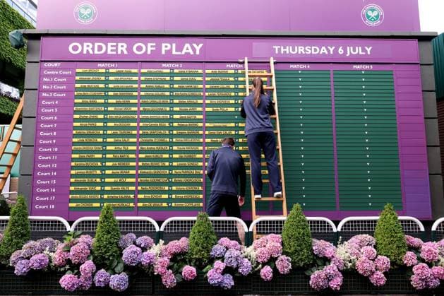 6th July 2023; All England Lawn Tennis and Croquet Club, London, England: Wimbledon Tennis Tournament; Order of play is being posted by Wimbledon staff  ActionPlus12527505 ShaunxBrooks
