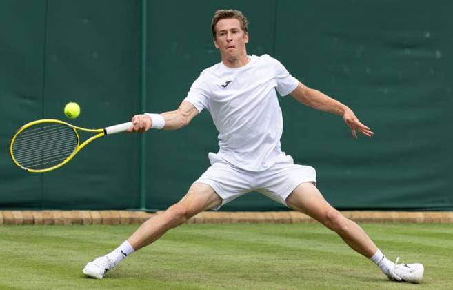 Belgian Kimmer Coppejans pictured in action during the second part of the match between Belgian Coppejans and Australian De Minaur, in the Men s Singles First Round, at the 2023 Wimbledon grand slam tennis tournament at the All England Tennis Club, in south-west London, Britain, Thursday 06 July 2023. Due to the bad weather, play had to be suspended on Tuesday and Wednesday, and lots of matches had to be postponed. BENOITxDOPPAGNE  x70181442x