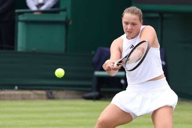 6th July 2023; All England Lawn Tennis and Croquet Club, London, England: Wimbledon Tennis Tournament; June Niemeier plays a backhand shot to Karolina Muchova  ActionPlus12527670 ShaunxBrooks