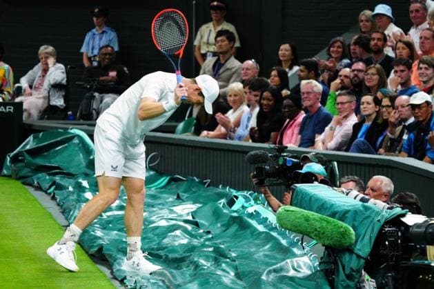Mandatory Credit: Photo by Javier Garcia Shutterstock (13995919jr) Andy Murray strikes the court cover during his second round match Wimbledon Tennis Championships, Day 4, The All England Lawn Tennis and Croquet Club, London, UK - 06 Jul 2023 Wimbledon Tennis Championships, Day 4, The All England Lawn Tennis and Croquet Club, London, UK - 06 Jul 2023  Copyright: xJavierxGarcia Shutterstockx 13995919jr
