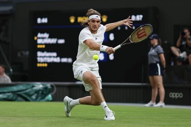 Wimbledon: Day Four 6 July 2023, Wimbledon - Wimbledon Tennis Championships - Day Four - Stefanos Tsitsipas (GRE) plays a backhand against Andy Murray (GBR) in their Gentlemen s Singles 2nd Round match - Photo: Charlotte Wilson Offside . Wimbledon UK Copyright: xCharlottexWilsonx xOffsidexOffside