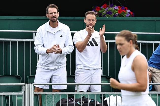 Christopher Kas (left, coach of Jule Niemeier, GER) during rain delayed first round of 2023 All England Lawn Tennis Championships at Wimbledon, womens singles, London, 06 07 2023; -