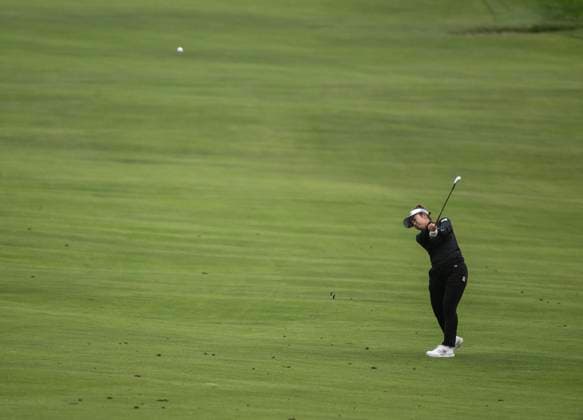 Hyo Joo Kim of Korea hits her approach shot on the 14th hole in round one of the Women s U.S. Open at Pebble Beach, California on Thursday, July 6, 2023.  PBP2023070626 TERRYxSCHMITT
