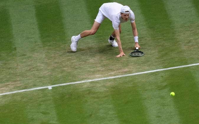 (230707) -- LONDON, July 7, 2023 -- Gijs Brouwer of the Netherlands competes during the men s singles first round match between Alexander Zverev of Germany and Gijs Brouwer of the Netherlands at Wimbledon tennis Championship in London, Britain, on July 6, 2023. ) (SP)BRITAIN-LONDON-TENNIS-WIMBLEDON-DAY 4 HanxYan 