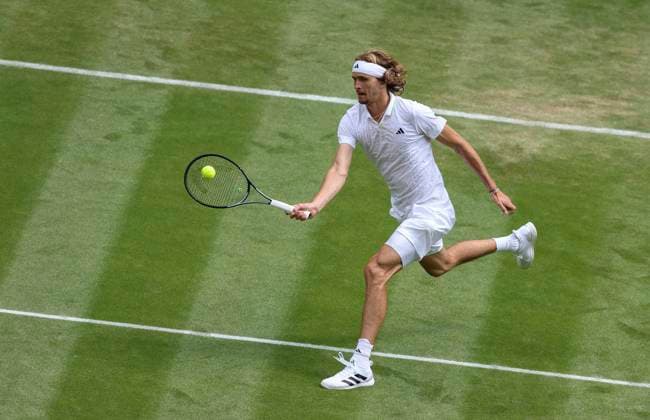 (230707) -- LONDON, July 7, 2023 -- Alexander Zverev of Germany competes during the men s singles first round match between Alexander Zverev of Germany and Gijs Brouwer of the Netherlands at Wimbledon tennis Championship in London, Britain, on July 6, 2023. ) (SP)BRITAIN-LONDON-TENNIS-WIMBLEDON-DAY 4 HanxYan 