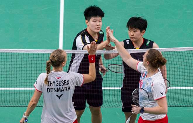 (230707) -- CALGARY, July 7, 2023 -- Liu Shengshu(2nd L) Tan Ning(2nd R) of China high-five with Maiken Fruergaard Sara Thygesen(1st L) of Denmark after their women s doubles second round match at the 2023 Canada Open badminton tournament in Calgary, Canada, on July 6, 2023. (Photo by Xinhua) (SP)CANADA-CALGARY-BADMINTON-CANADA OPEN-WOMEN S DOUBLES ZouxZheng 