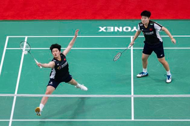 (230707) -- CALGARY, July 7, 2023 -- Liu Shengshu(R) Tan Ning of China compete during the women s doubles second round match between Liu Shengshu Tan Ning of China and Maiken Fruergaard Sara Thygesen of Denmark at the 2023 Canada Open badminton tournament in Calgary, Canada, on July 6, 2023. (Photo by Xinhua) (SP)CANADA-CALGARY-BADMINTON-CANADA OPEN-WOMEN S DOUBLES ZouxZheng 