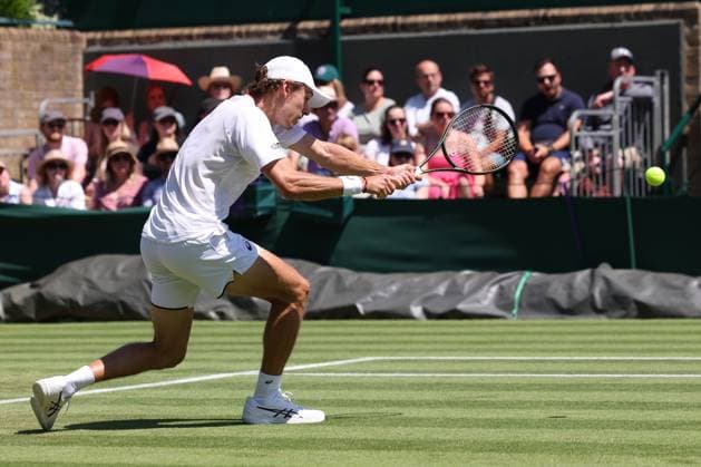 7th July 2023; All England Lawn Tennis and Croquet Club, London, England: Wimbledon Tennis Tournament; Alex De Minaur plays a backhand shot to Matteo Berrettini  ActionPlus12527918 ShaunxBrooks