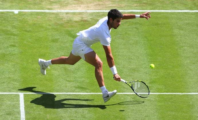 Mandatory Credit: Photo by Ella Ling Shutterstock (13995924s) Carlos Alcaraz in action against Alexandre Muller Wimbledon Tennis Championships, Day 5, The All England Lawn Tennis and Croquet Club, London, UK - 07 Jul 2023 Wimbledon Tennis Championships, Day 5, The All England Lawn Tennis and Croquet Club, London, UK - 07 Jul 2023  Copyright: xEllaxLing Shutterstockx 13995924s