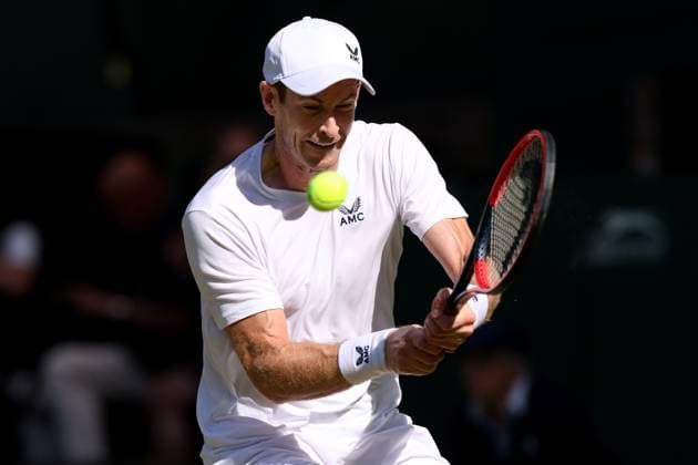 7th July 2023; All England Lawn Tennis and Croquet Club, London, England: Wimbledon Tennis Tournament; Andy Murray plays a backhand shot to Stefanos Tsitsipas  ActionPlus12528089 ShaunxBrooks