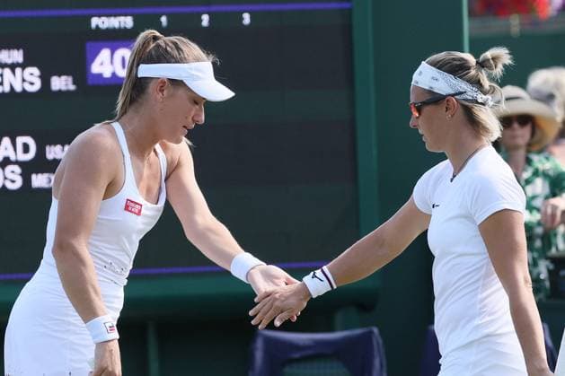 The Championships Wimbledon 2023- DAY 5- 07 07 2023 Great Britain, London, All England Lawn Tennis Club, The Championships Wimbledon 2023 - DAY 5- 07 07 2023 Belgian player Kirsten Flipkens (BEL) and her doubles partner Timea Babos (HUN) pictured during their first round double match in London , All England Lawn Tennis Club at The Championships Wimbledon 2023 LONDON GREAT BRITAIN  Copyright: xMélaniexJeusettex